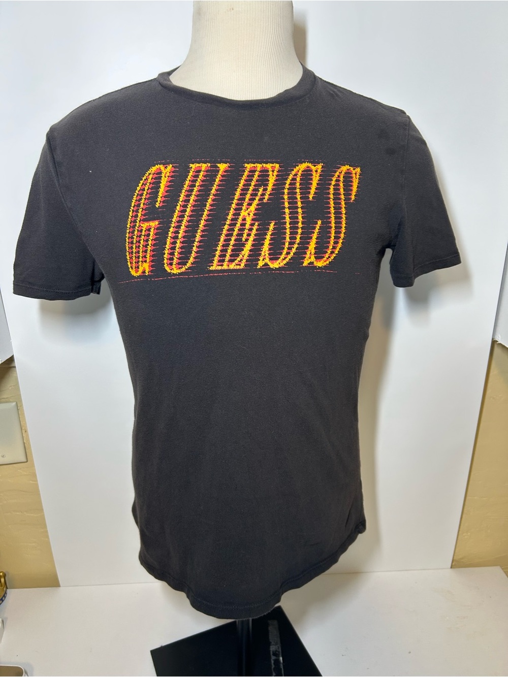 Guess Black Short Sleeve Tee with Orange-Yellow Logo